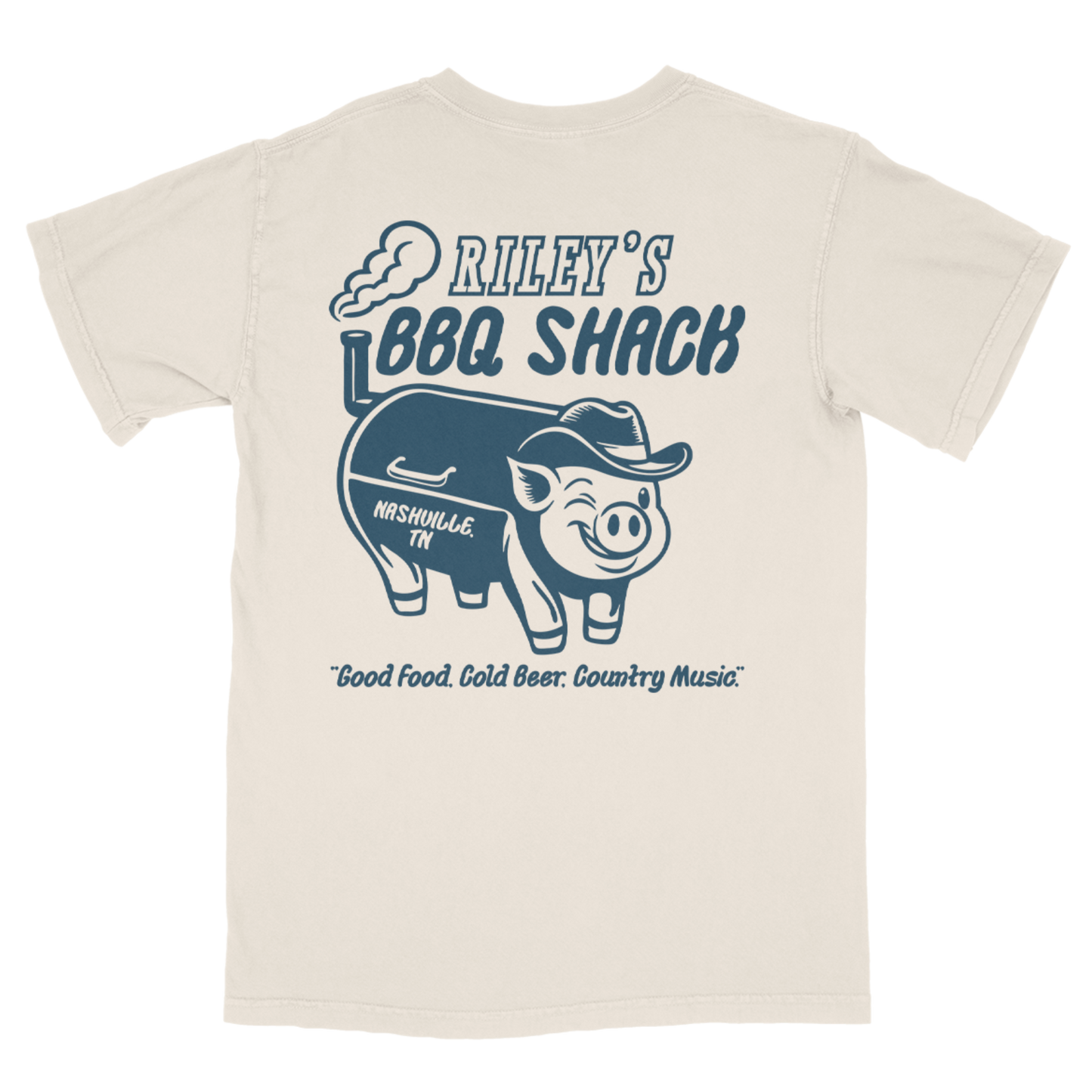 Beige t-shirt with blue graphic of a pig wearing a hat and text 'Riley's BBQ Shack' on a white background